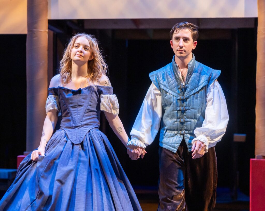 Actors in blue period costume performing Shakespeare in Love
