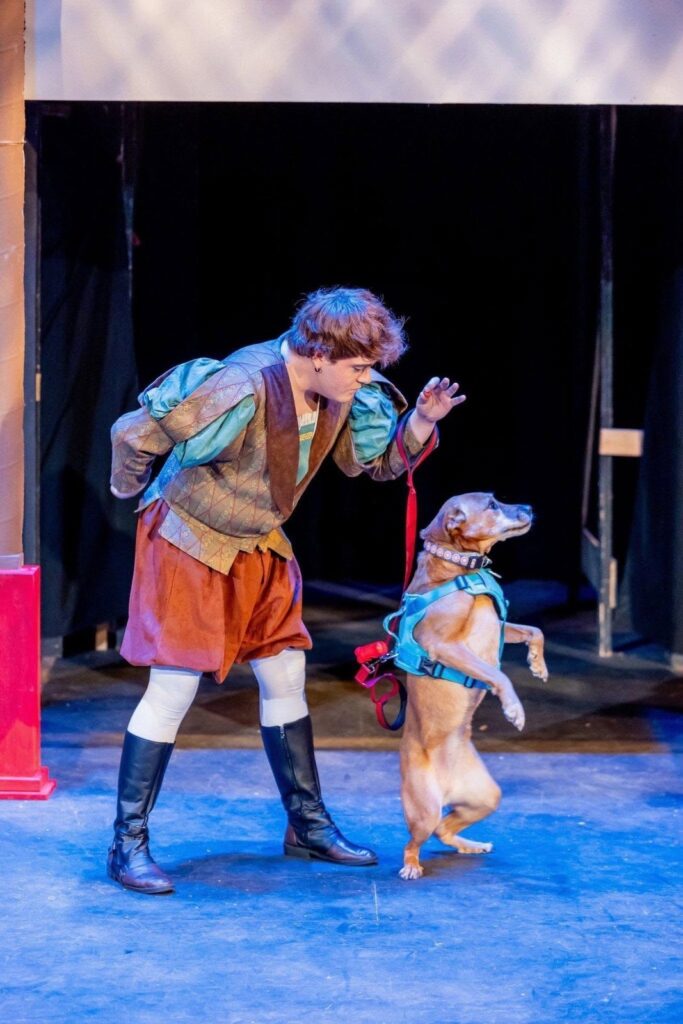 Launce and his dog Crab on stage in Two Gentlemen of Verona