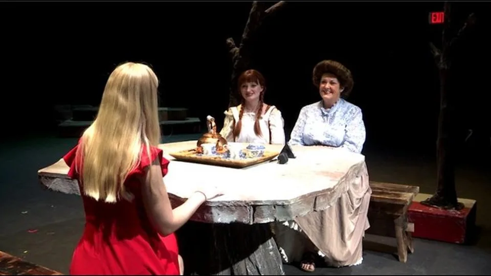 A FOX23 News reporter interviews Sagely Long as Anne and Cathy Woods as Marilla on the set of Anne of Green Gables